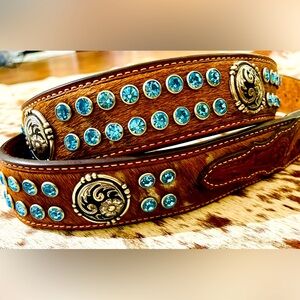 Nocona genuine Cow hide leather belt with icy blue stones and silver conchos.